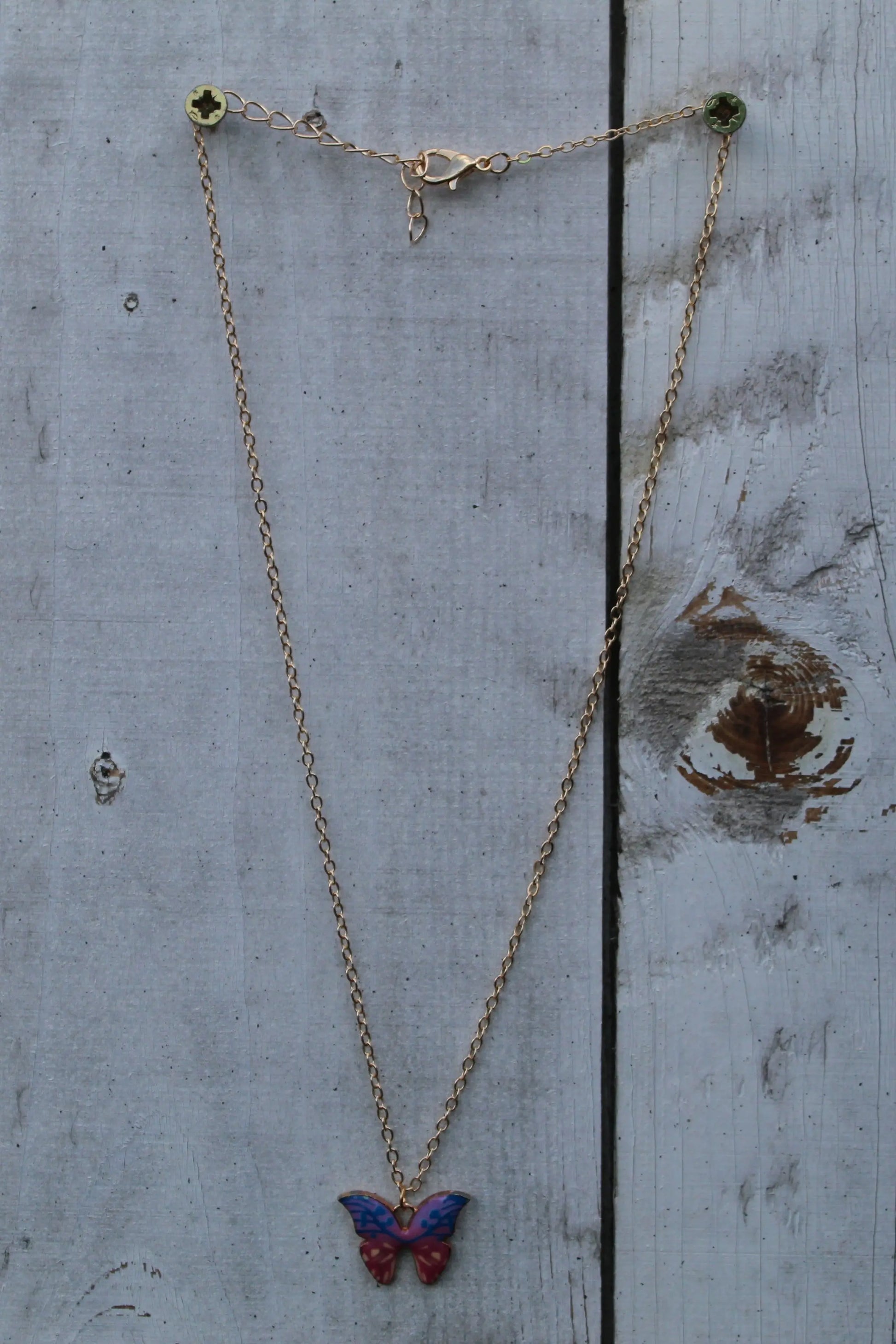 Vlinder Ketting met Symboliek – Paars & Rood Design Sparcle.shop